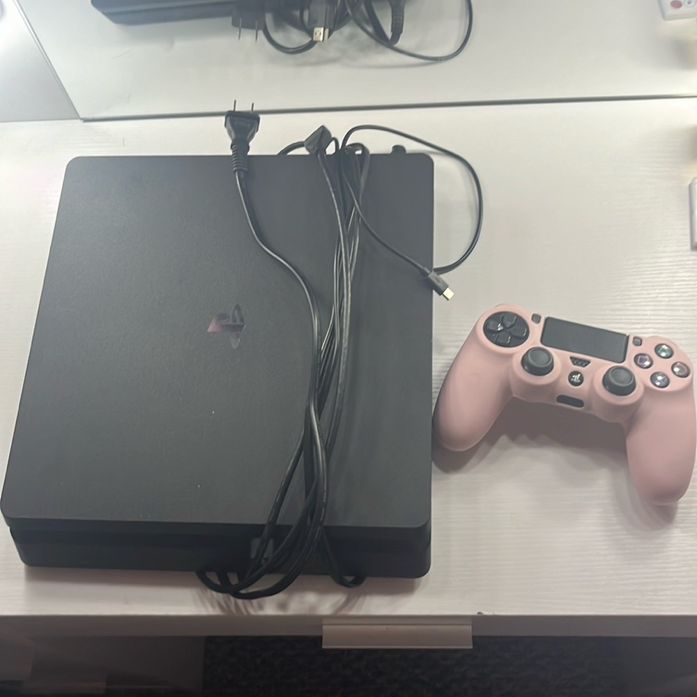 Play station 4 brand new. with controller and controller cover.